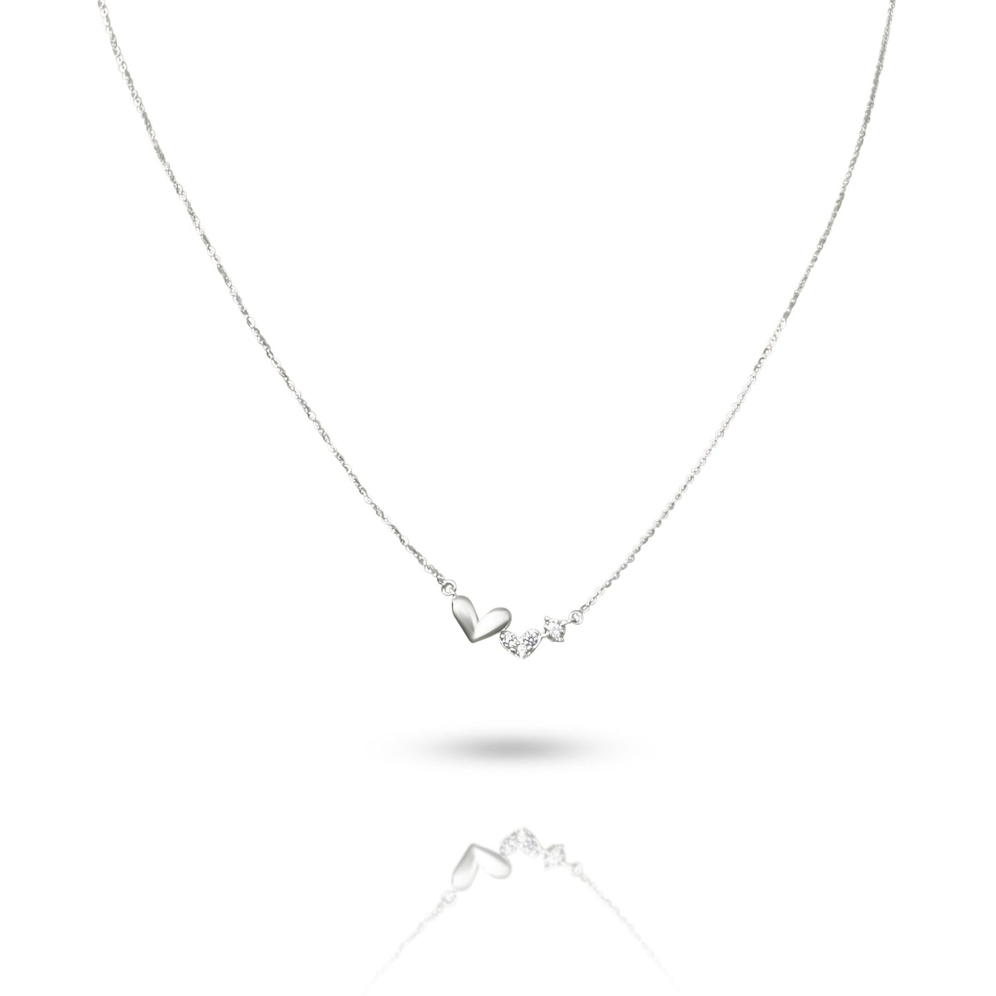 Three hearts necklace in 10k Italian white gold with zirconias