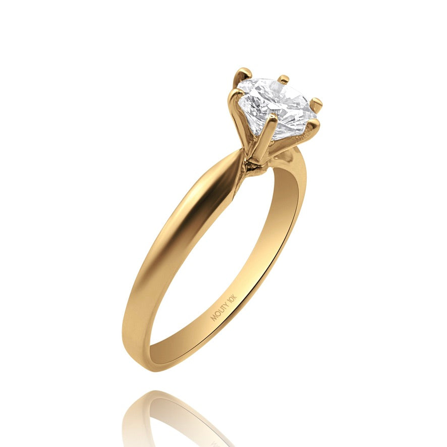 10k yellow gold ring with round zirconia Code: MAN315