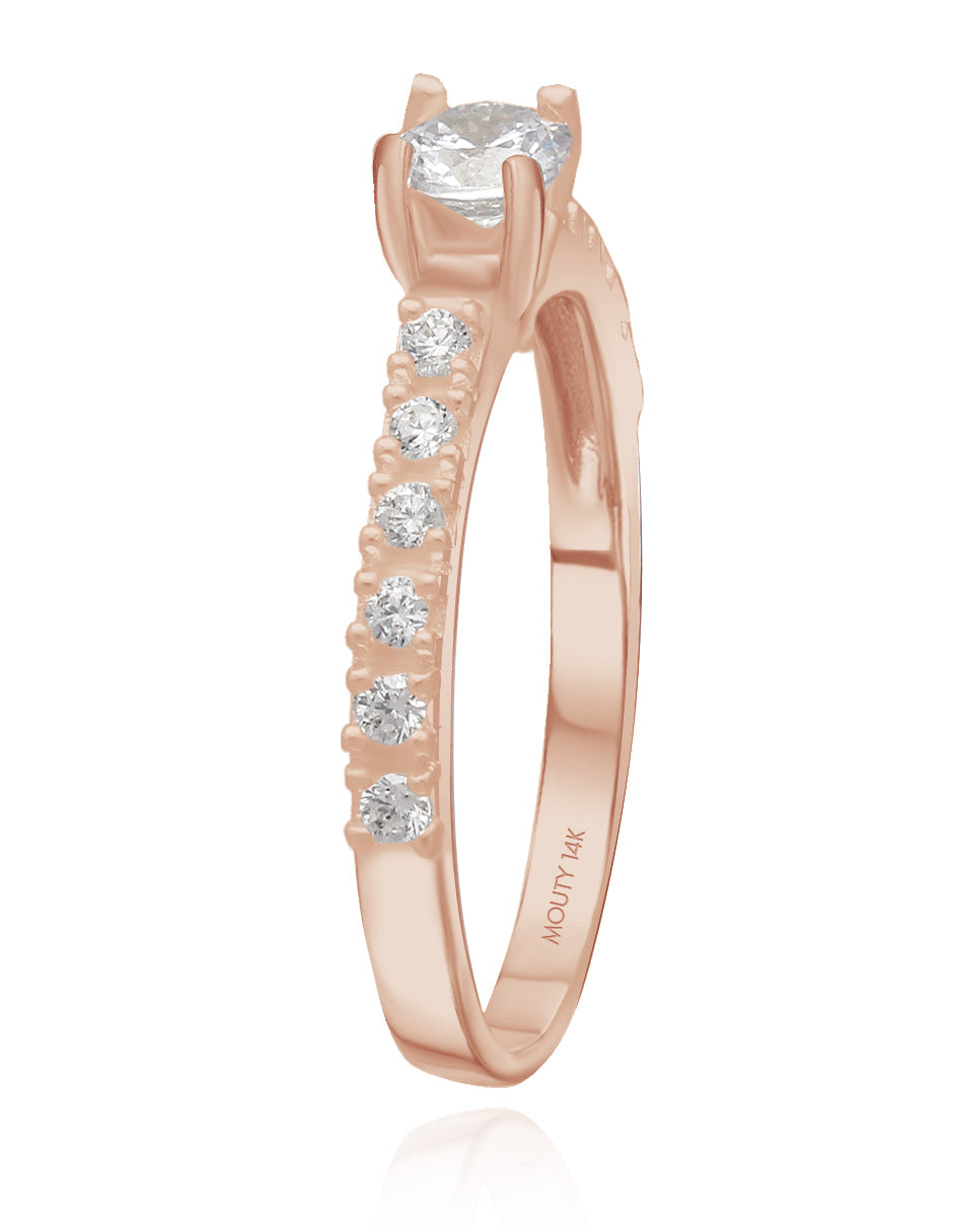 Amour ring in 14k rose gold with zircons 