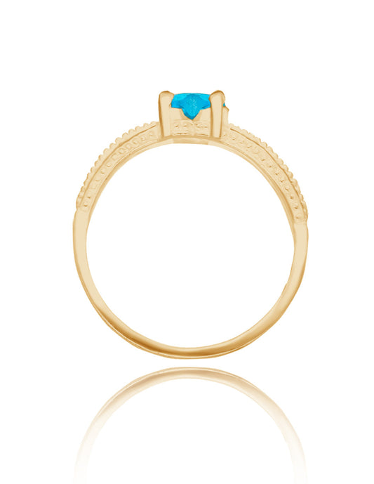 Anillo Fanny en plata con baño de oro amarillo con circonia azul cielo