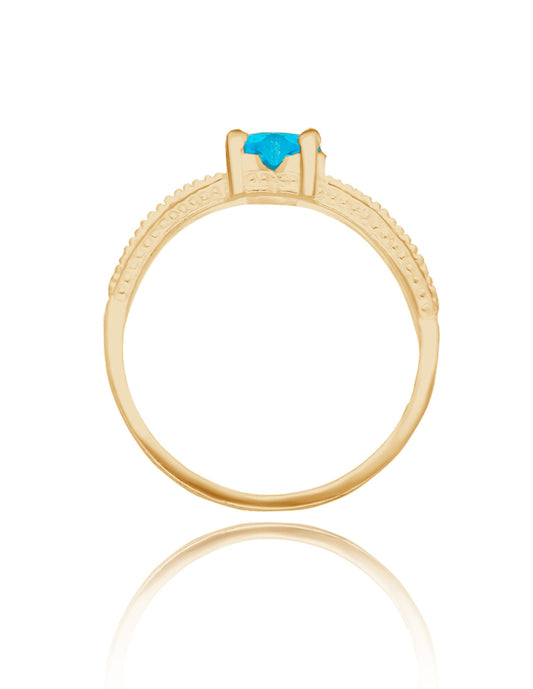 Anillo Fanny en oro amarillo 10k con circonia azul cielo