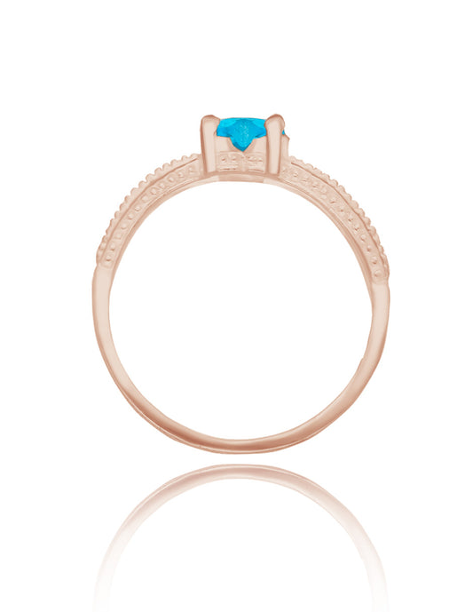 Fanny ring in 14k rose gold with sky blue zirconia