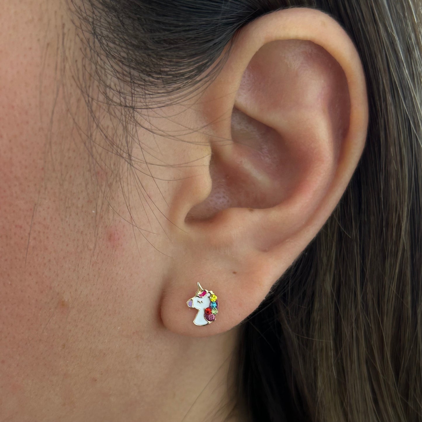 Unicorn studs in 10k yellow gold with zircons Code: 14281 8.5mm