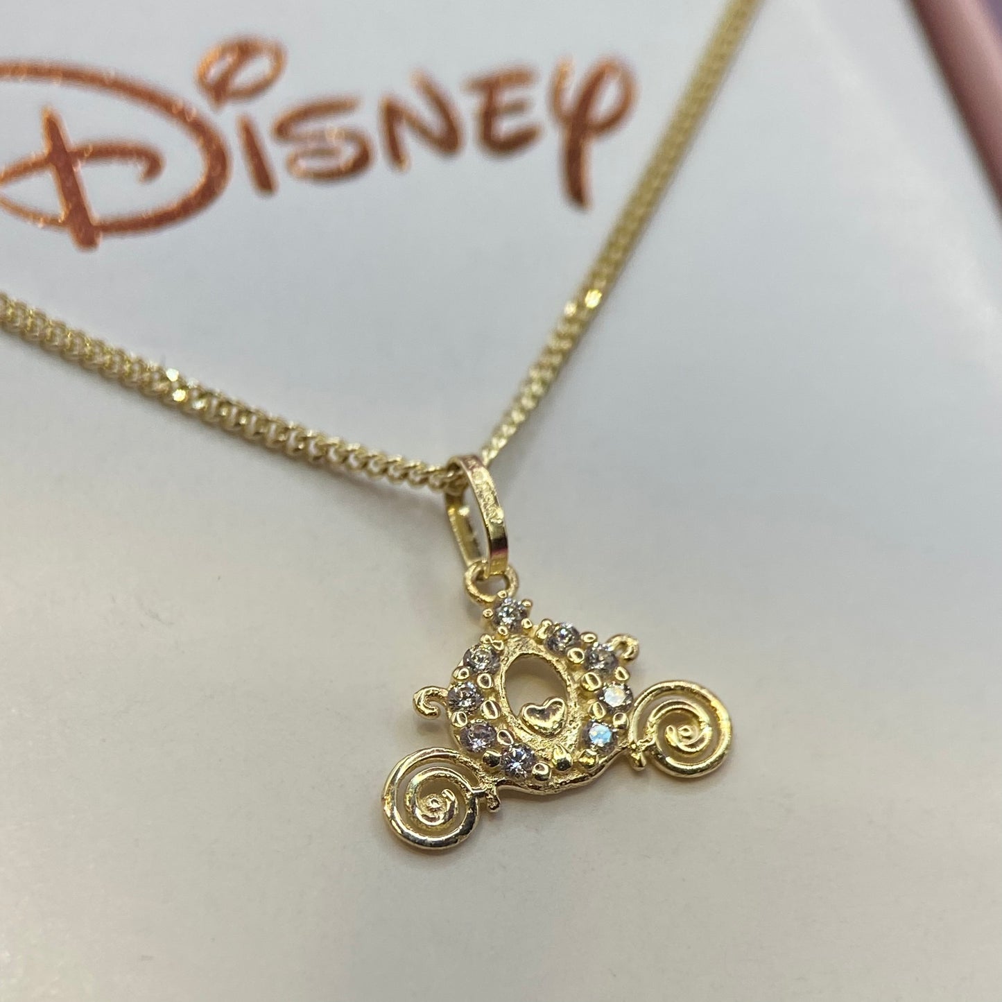 Carriage Necklace with white zirconias embedded in 10k yellow gold Disney®️