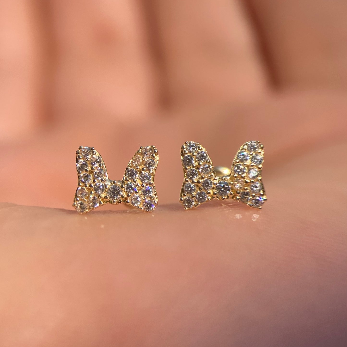 Minnie bow brooches in 10k yellow gold with zircons Disney®️