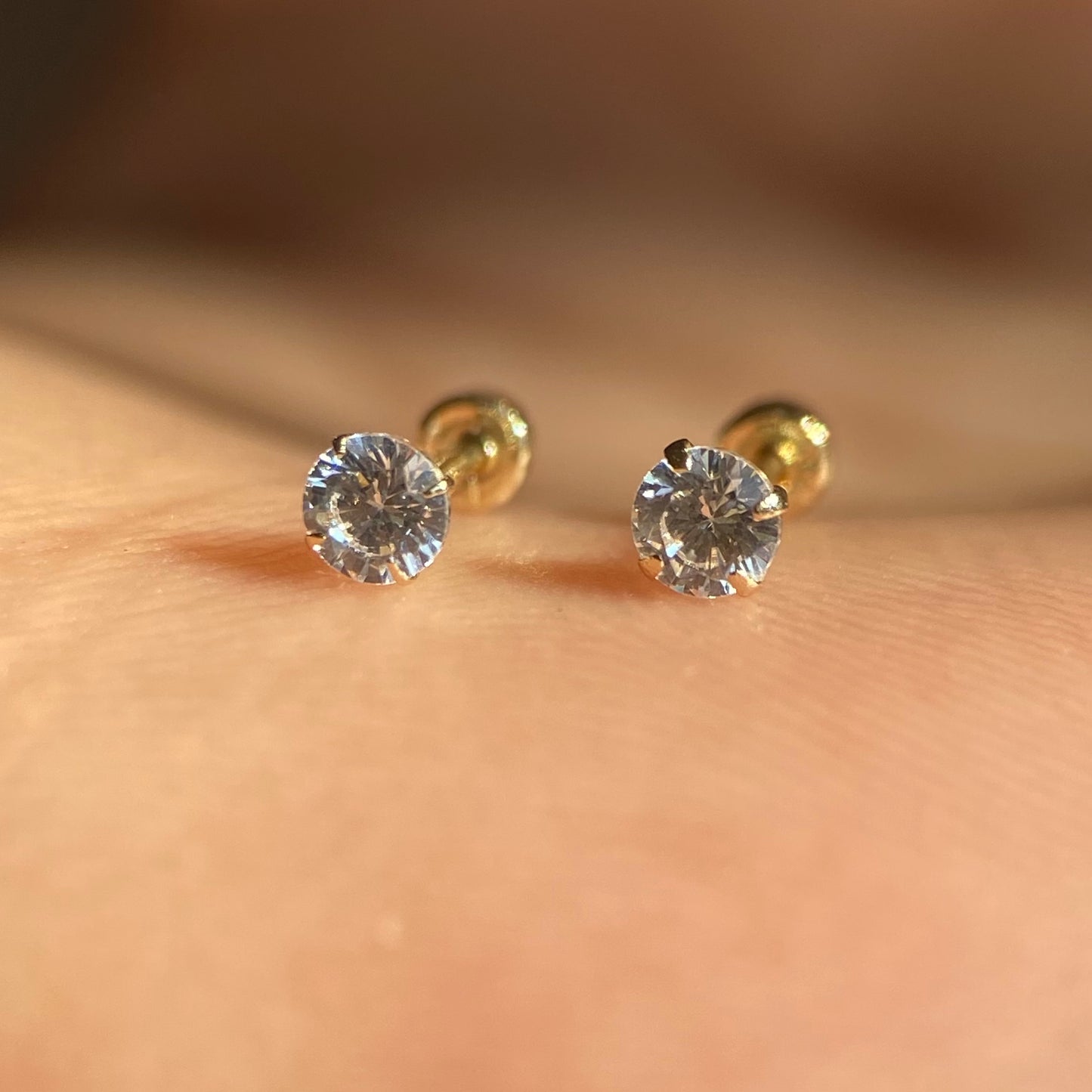 Straight echo studs in 14k yellow gold with zirconia Cod: 14303 3mm