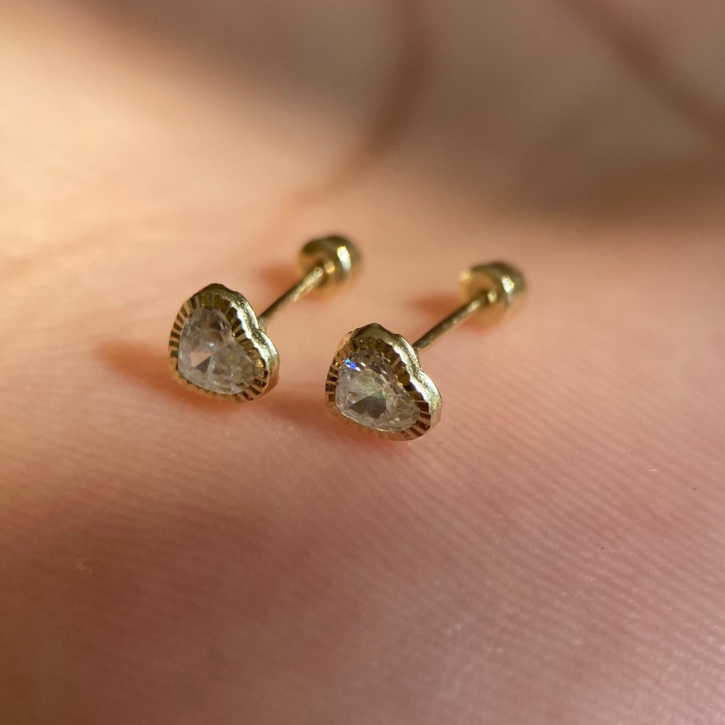 Straight heart studs with 4x4 diamond bezel in 14k yellow gold with zirconia Code: 14307