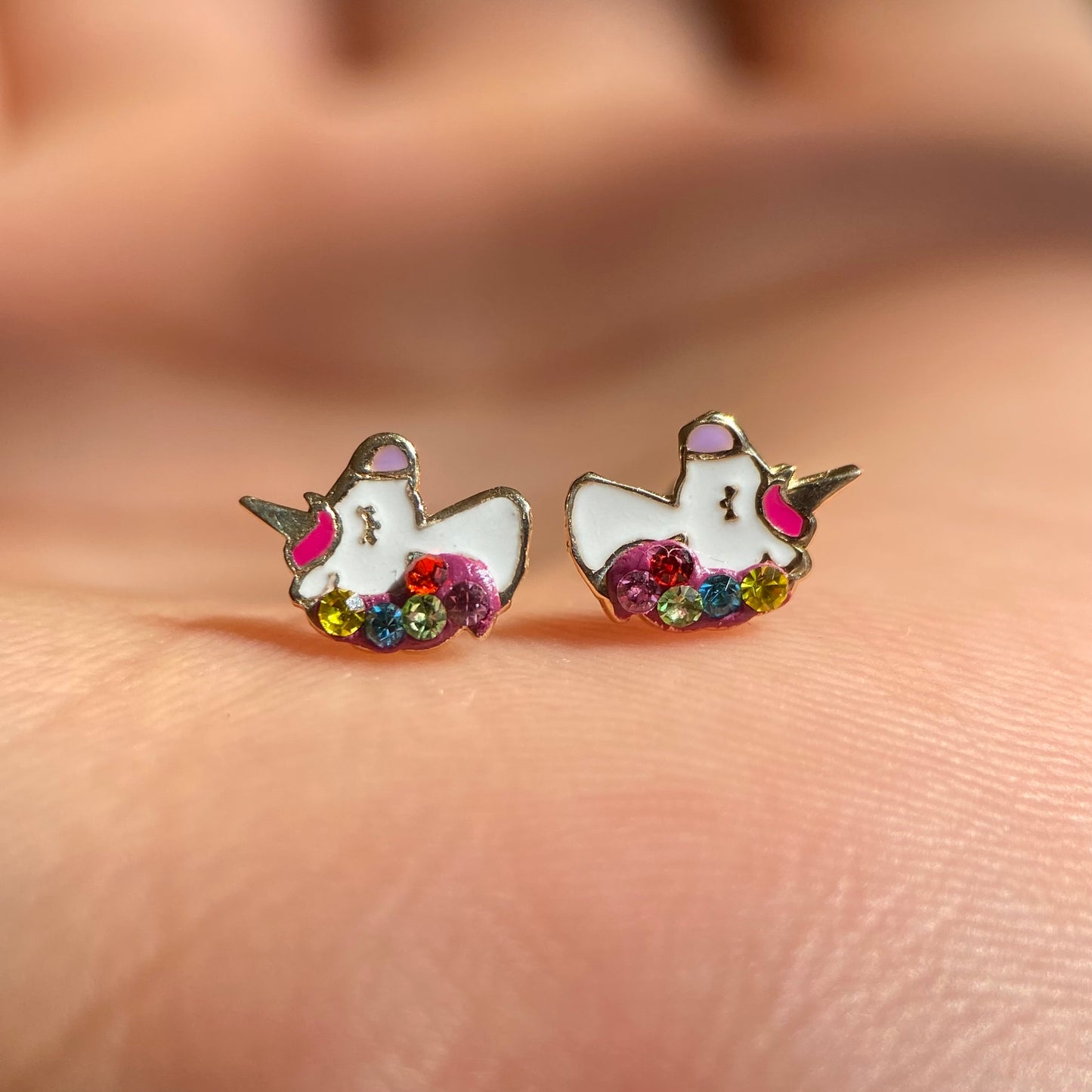 Unicorn studs in 10k yellow gold with zircons Code: 14281 8.5mm