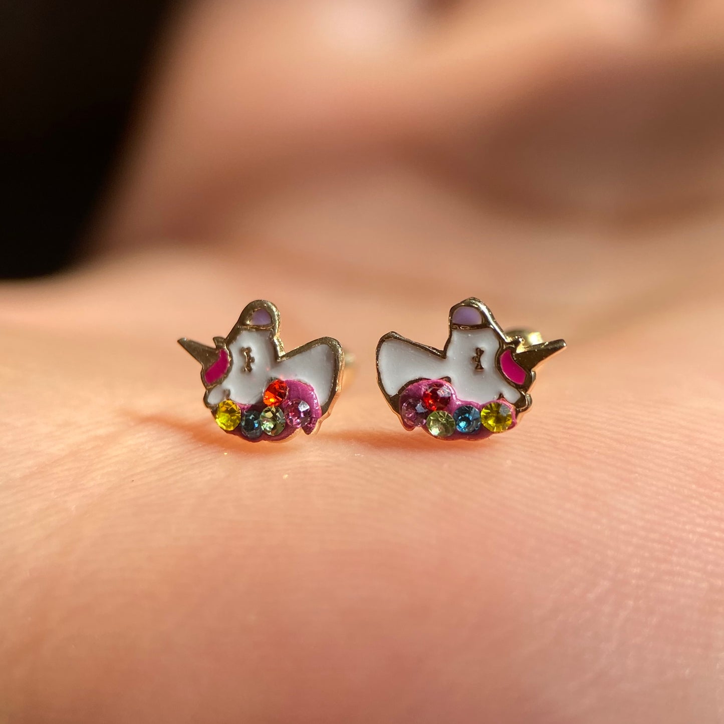 Unicorn studs in 10k yellow gold with zircons Code: 14281 8.5mm