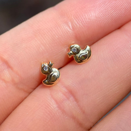 Sea duck bucklers in 10k yellow gold with zirconia Cod: 14297 6.5mm