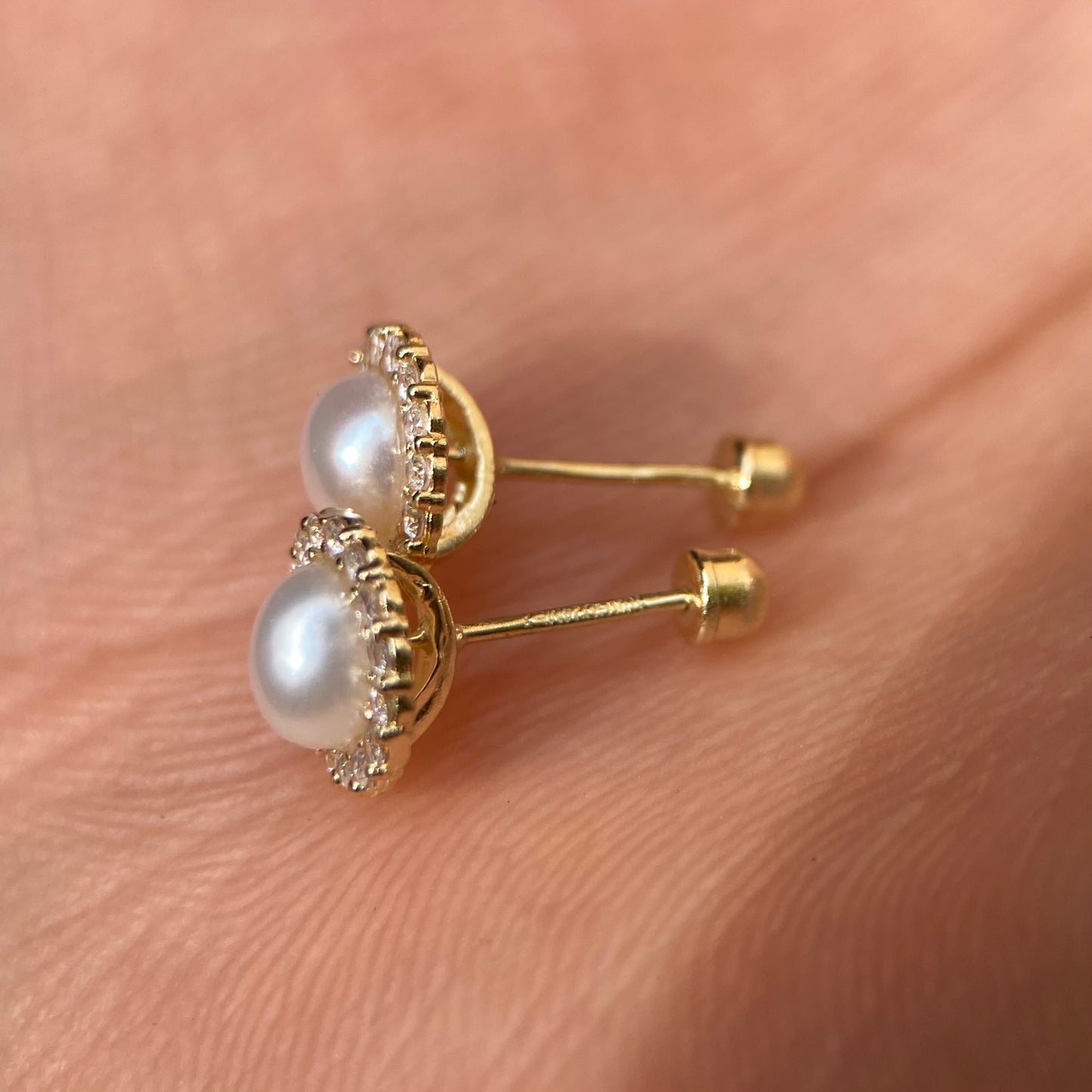 10k yellow gold pave bezel studs with pearl with zircons Code: 14280 6.5mm