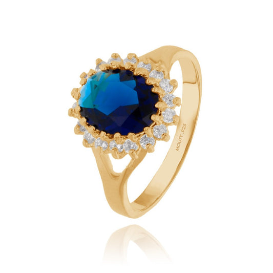 Anillo Renata en plata con baño de oro amarillo con circonia azul (Lady Di)