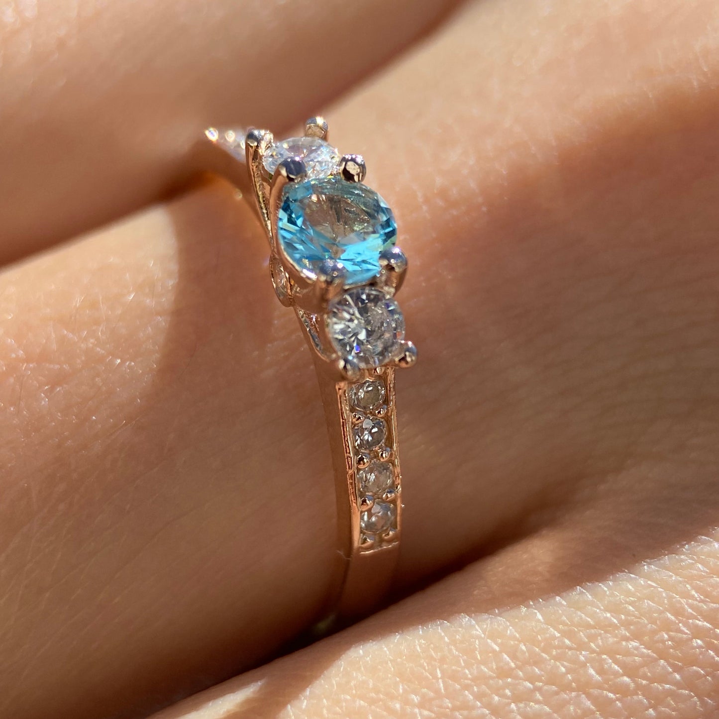 Cielo ring in 10k rose gold with blue zirconia