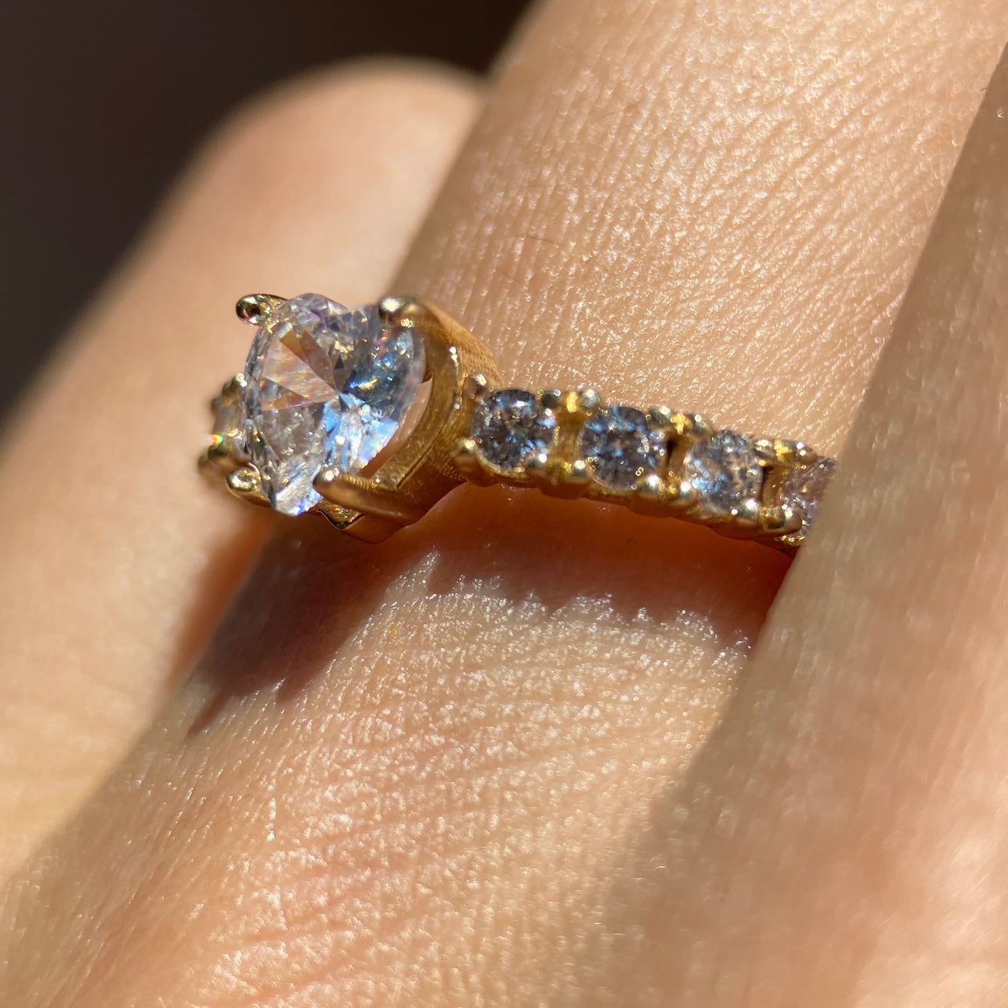 Amour ring in 10k yellow gold with zircons